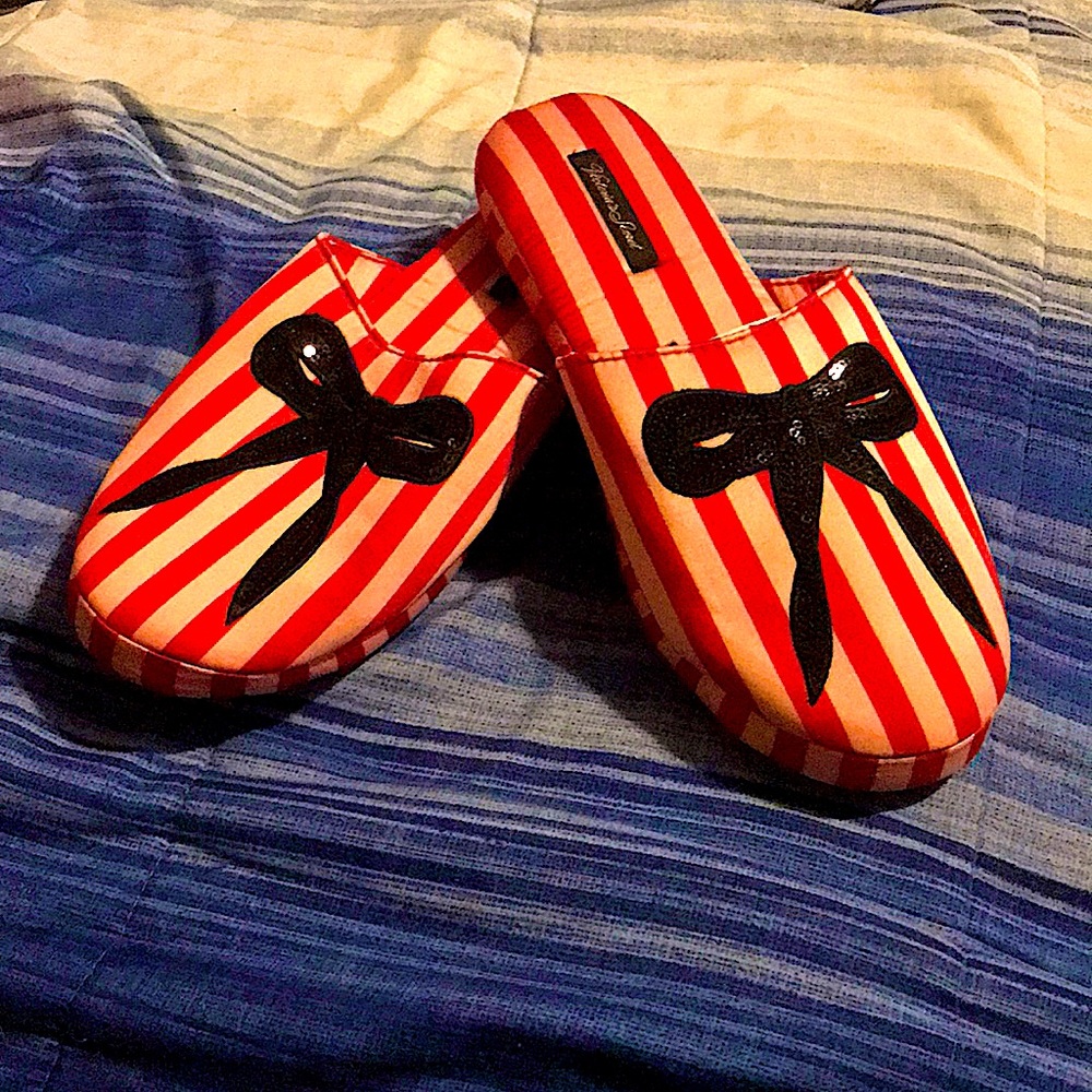 VS slippers, red and pink stripped with a design of a black bow. New with tags.